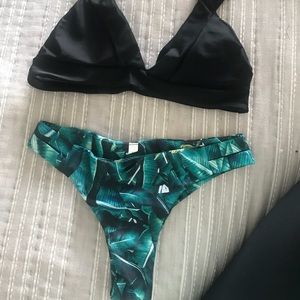 Sold!!!!   Tropical bikini black top leafy bottom